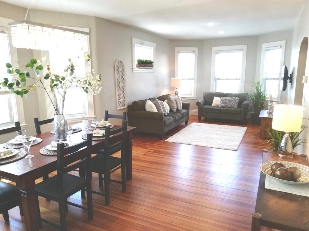 476 Albemarle Road, Unit 1 Newton, MA 02460 - Photo 4 of 20 a living room with furniture rug and wooden floor