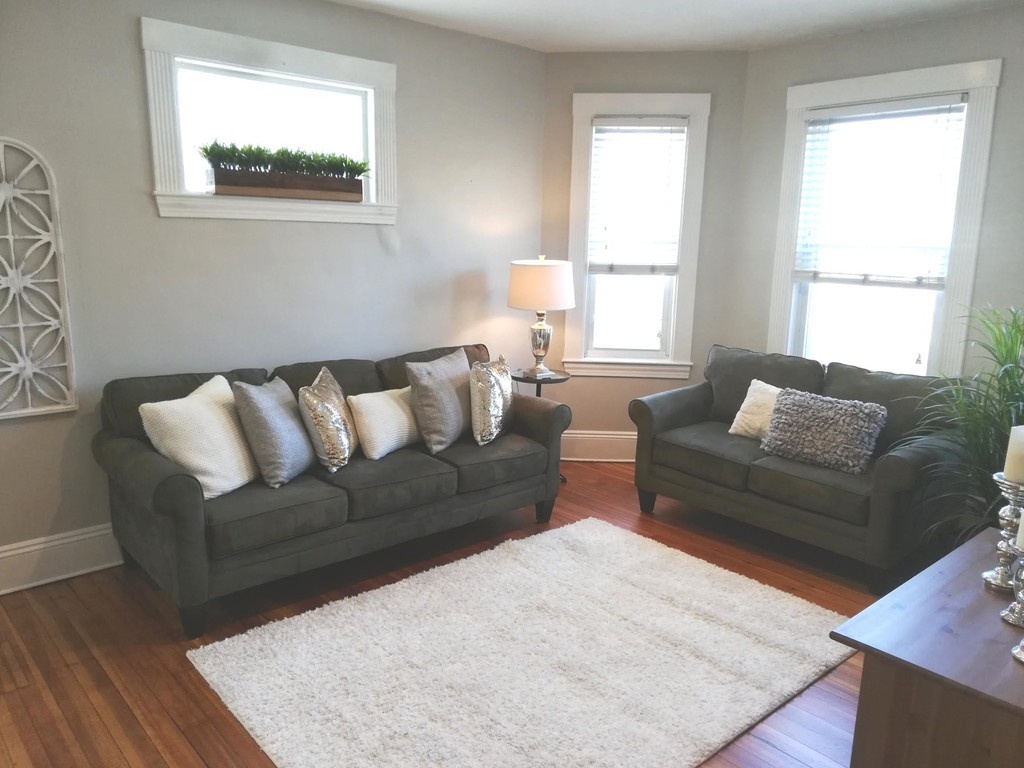 476 Albemarle Road, Unit 1 Newton, MA 02460 - Photo 6 of 20 a living room with furniture and a window