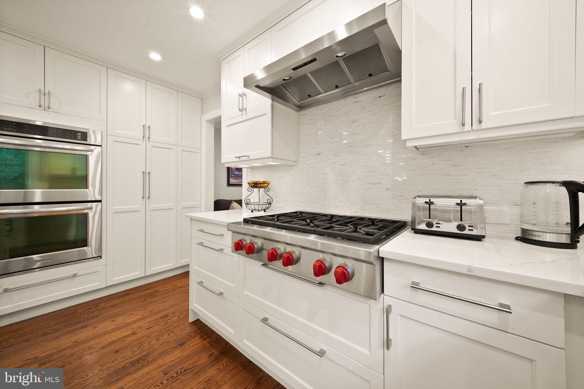 1716 Besley Road Vienna, VA 22182 - Photo 16 of 48 Wolf 6-burner gas cooktop. Double wall ovens.