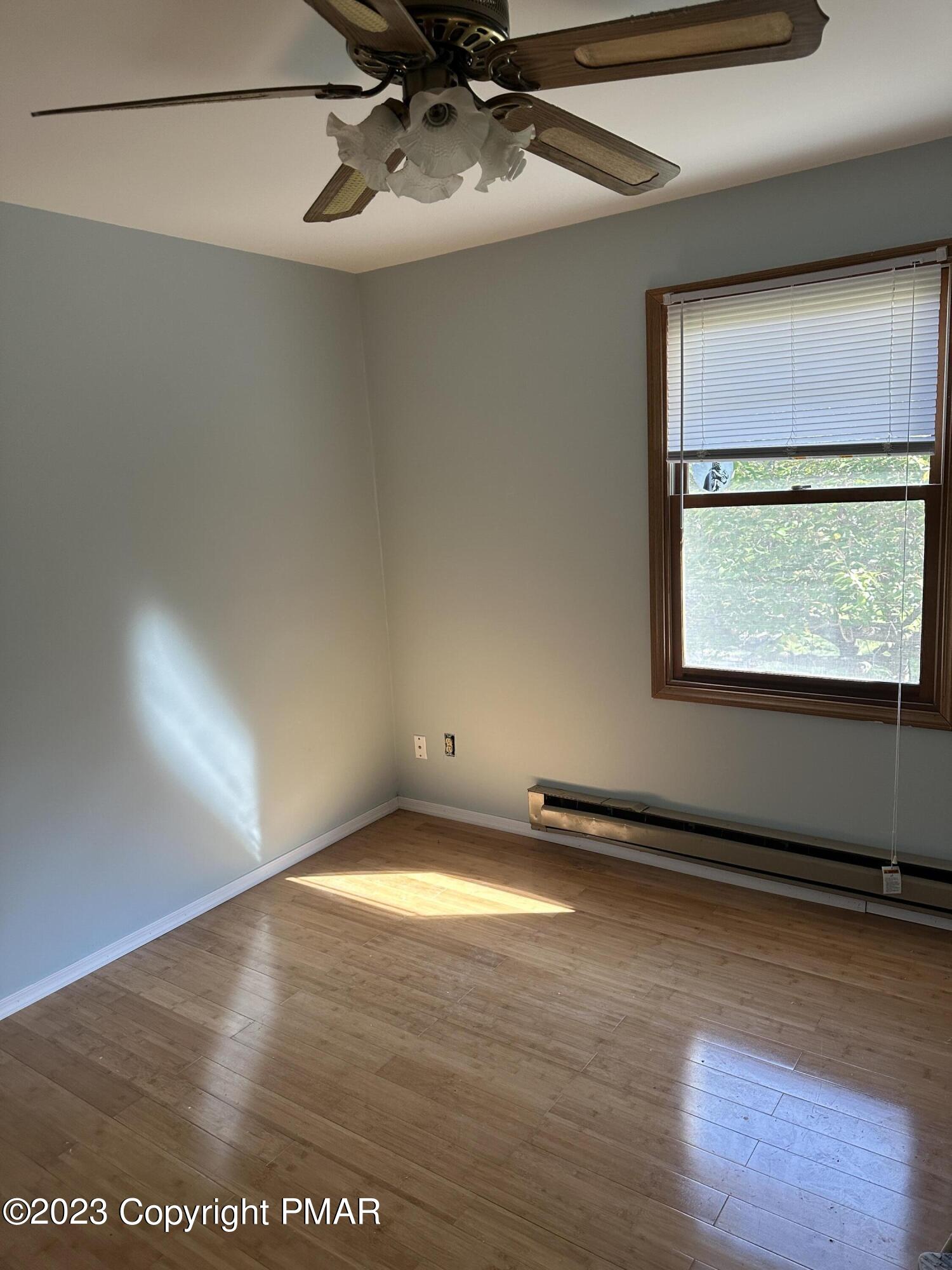 4215 Pine Ridge Drive East Bushkill, PA 18324 - Photo 11 of 18 a view of an empty room with a window