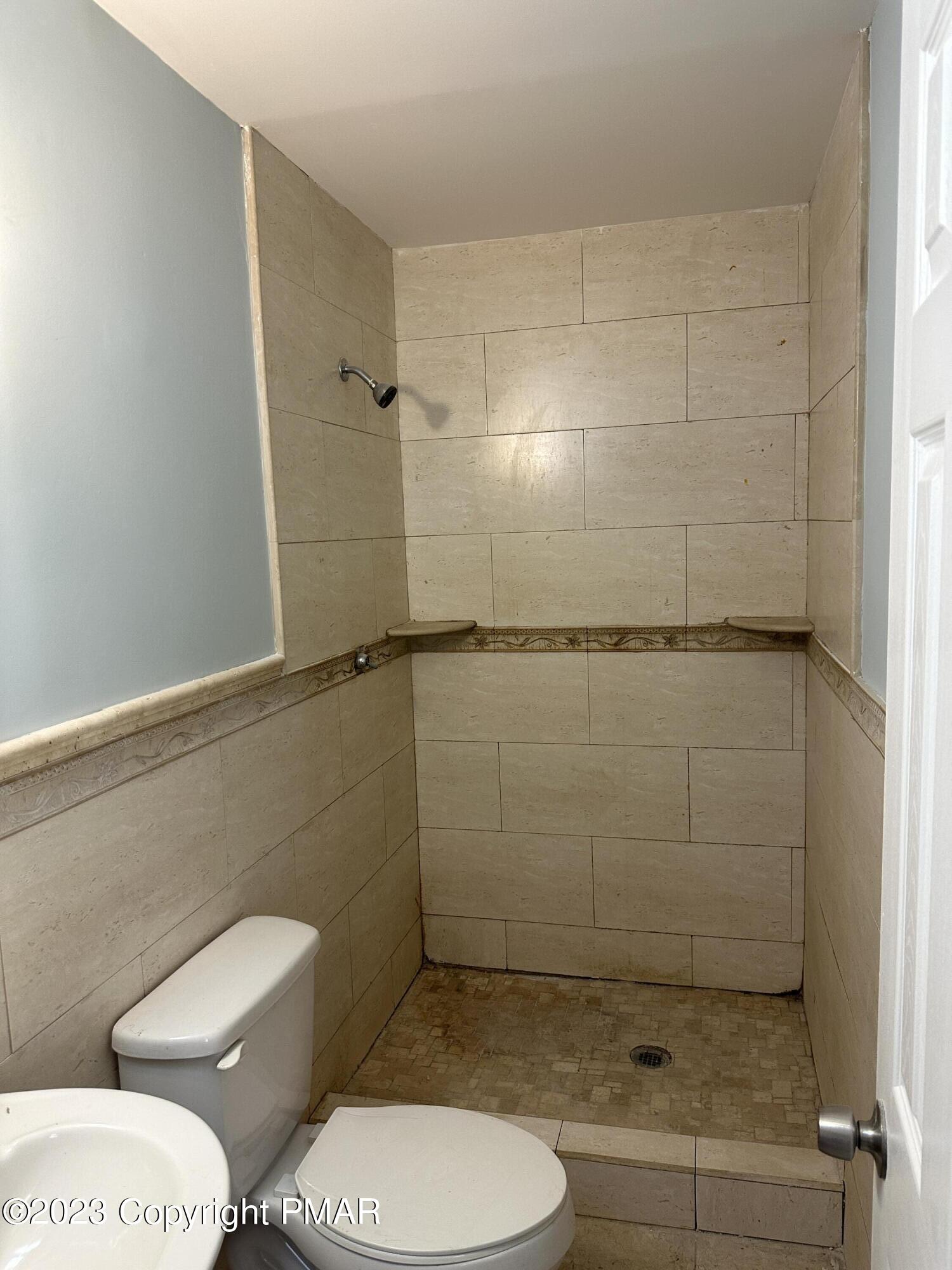 4215 Pine Ridge Drive East Bushkill, PA 18324 - Photo 9 of 18 a bathroom with a toilet and a shower