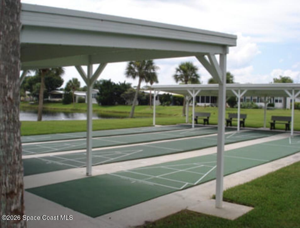 7579 Boxelder Road Micco, FL 32976 - Photo 27 of 30 a view of park with deck and a garden