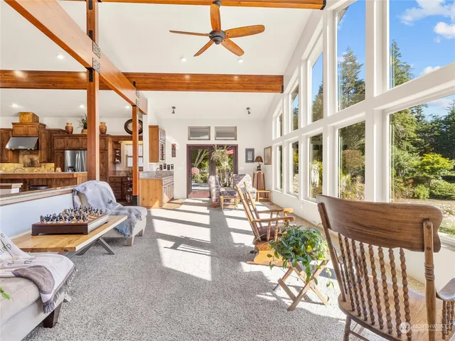 a view of swimming pool with seating area