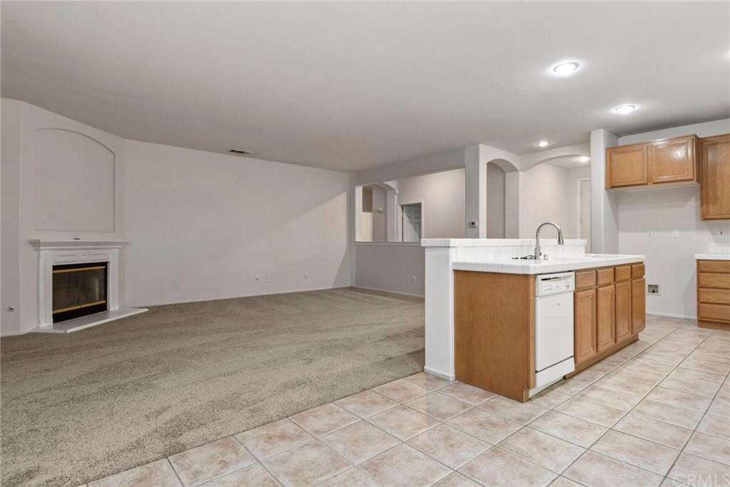 32175 Beaulieu Road Winchester, CA 92596 - Photo 12 of 31 a view of a kitchen with a sink