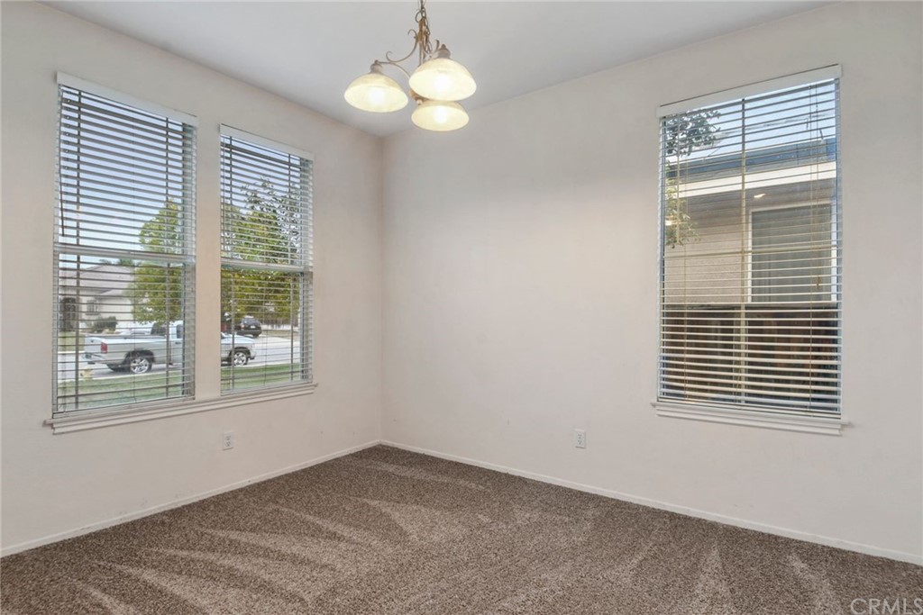 32175 Beaulieu Road Winchester, CA 92596 - Photo 16 of 31 a view of an empty room with a window