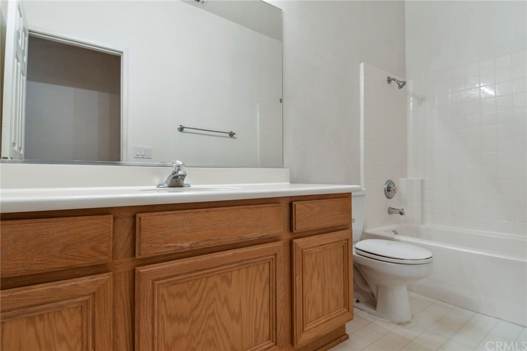 32175 Beaulieu Road Winchester, CA 92596 - Photo 21 of 31 a bathroom with a sink a toilet and shower