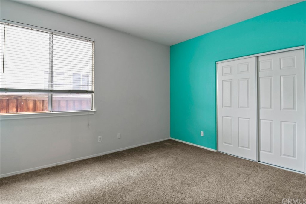 32175 Beaulieu Road Winchester, CA 92596 - Photo 26 of 31 an empty room with a window