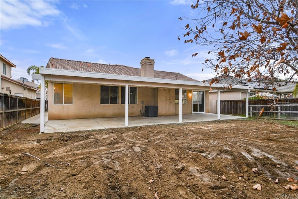 32175 Beaulieu Road Winchester, CA 92596 - Photo 28 of 31 a front view of a house with a garden