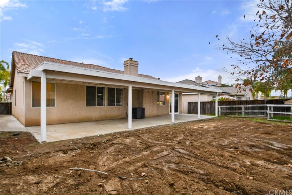 32175 Beaulieu Road Winchester, CA 92596 - Photo 29 of 31 a front view of a house with a garden