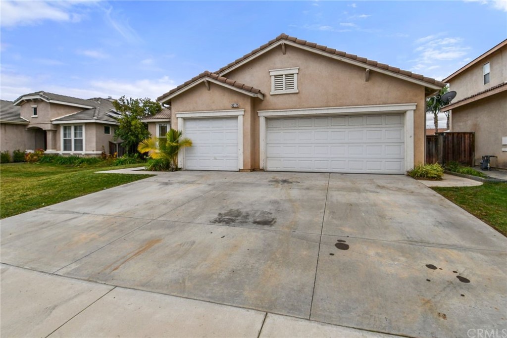 32175 Beaulieu Road Winchester, CA 92596 - Photo 3 of 31 a view of a house with a yard and large tree