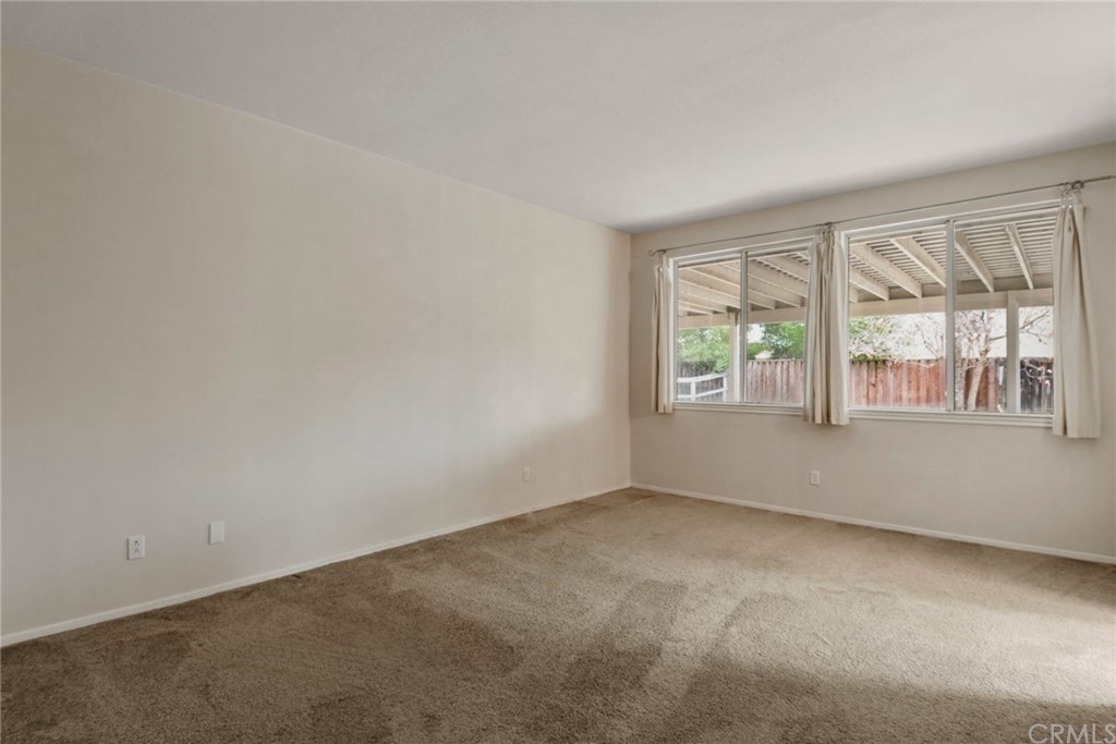 32175 Beaulieu Road Winchester, CA 92596 - Photo 8 of 31 an empty room with windows