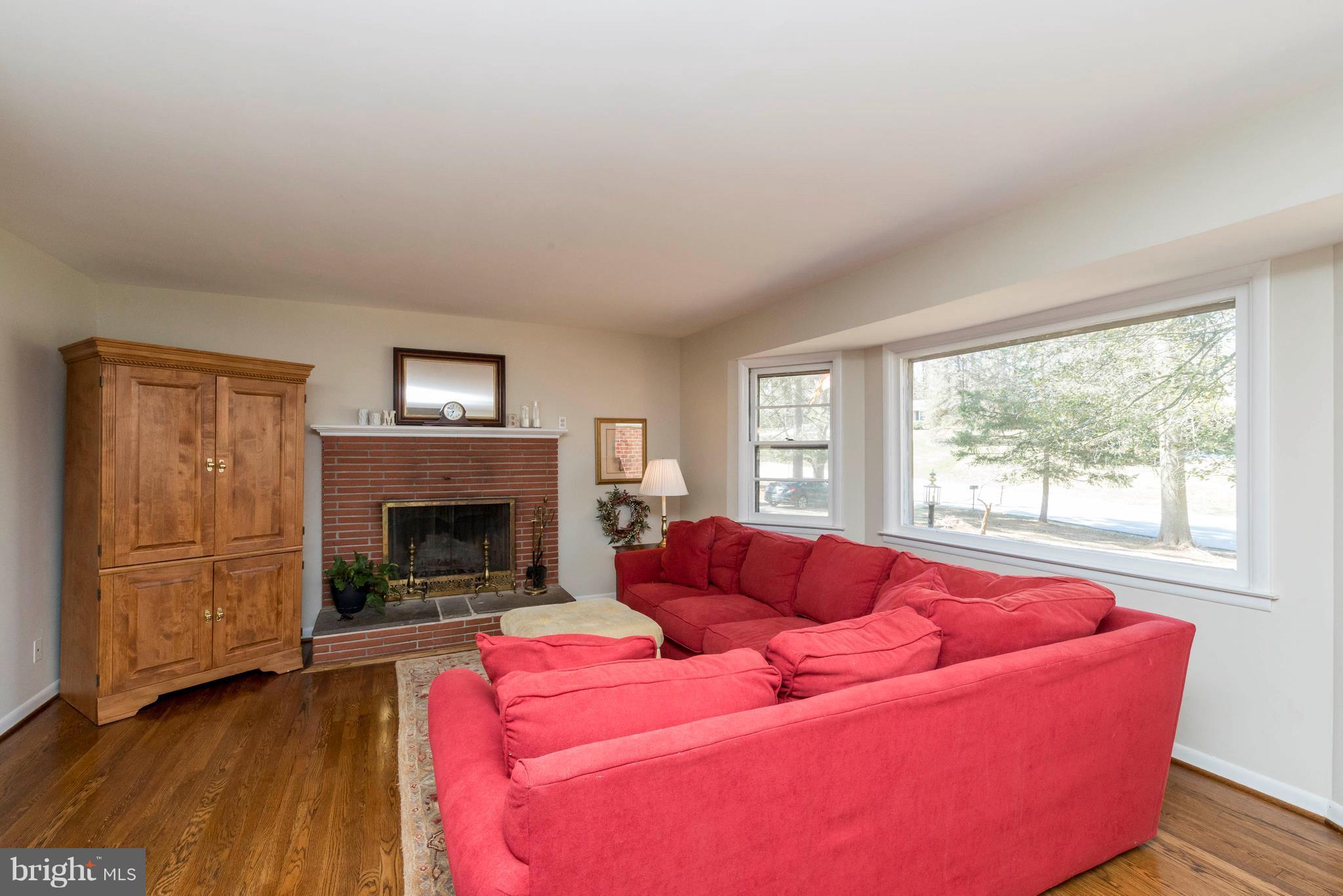 1911 Pot Spring Road Lutherville-Timonium, MD 21093 - Photo 5 of 30 Living Room with Wood-Burning FP
