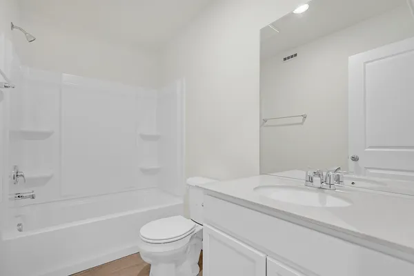 a bathroom with a sink toilet and a bathtub