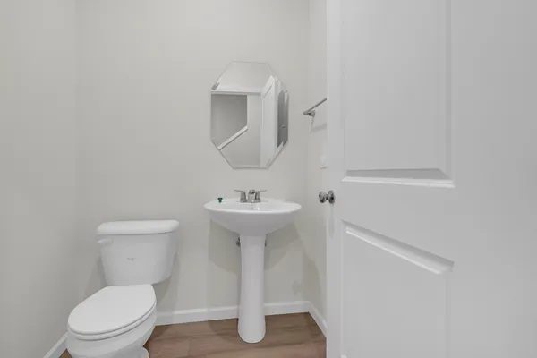 a bathroom with a sink toilet