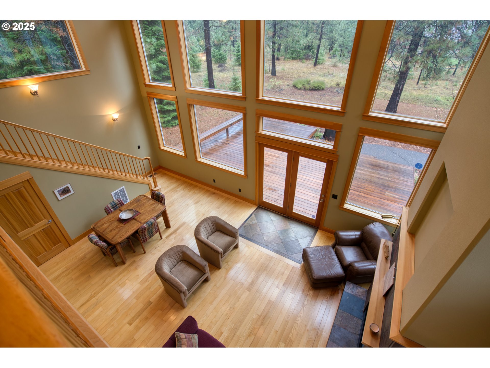 10 Emma Lane Trout Lake, WA 98650 - Photo 30 of 45 a living room with furniture and a floor to ceiling window