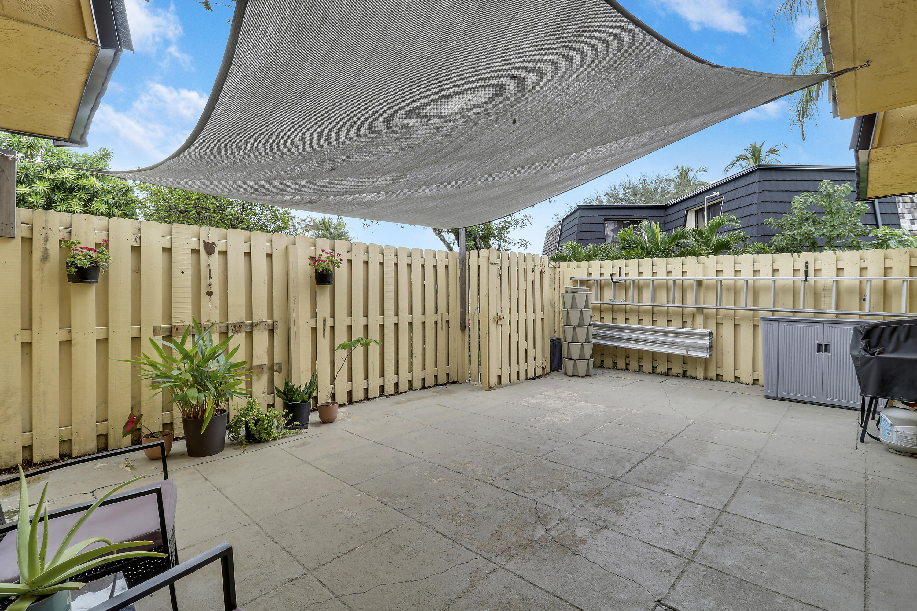 187 Woodland Road Palm Springs, FL 33461 - Photo 3 of 29 a view of backyard with garden and plants