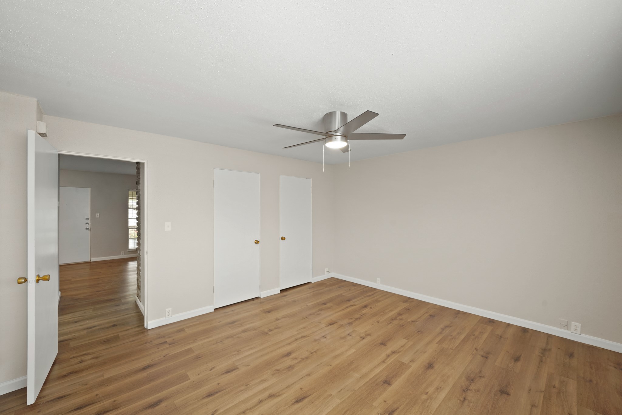 2201 Fountain View Drive, Unit 60F Houston, TX 77057 - Photo 12 of 18 a view of a room with wooden floor