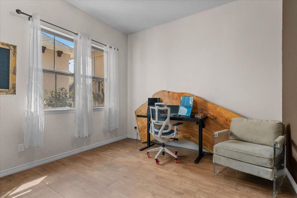 6705 Destination Way Jonestown, TX 78645 - Photo 19 of 39 Currently used as an office space, this bright room is so versatile and can be used as a bedroom, play room or hobby room as well.