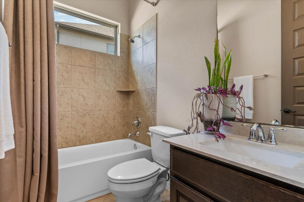 6705 Destination Way Jonestown, TX 78645 - Photo 22 of 39 This bathroom is bright and clean and ready for your guests.