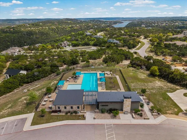 an aerial view of a house with a lake view
