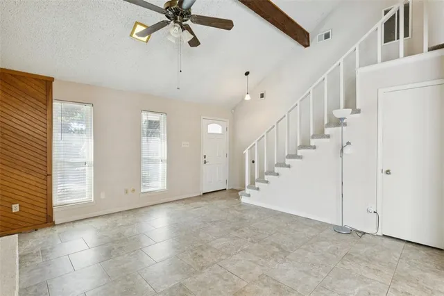 a view of an entryway with a workspace