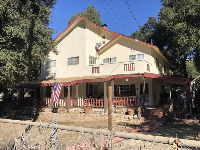 a front view of a house with a porch