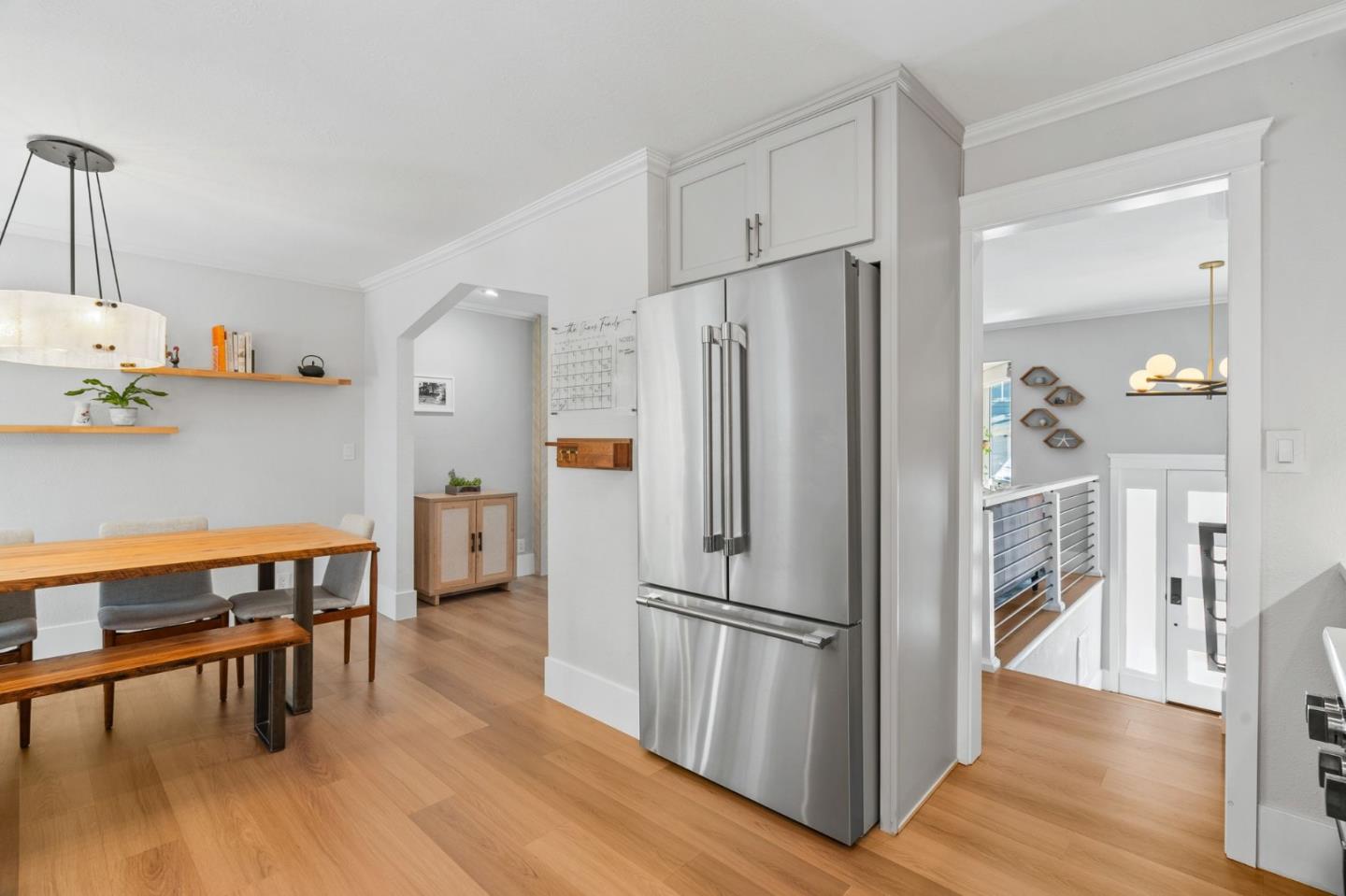 1085 Barcelona Drive Pacifica, CA 94044 - Photo 10 of 55 a kitchen with stainless steel appliances a refrigerator and wooden floor