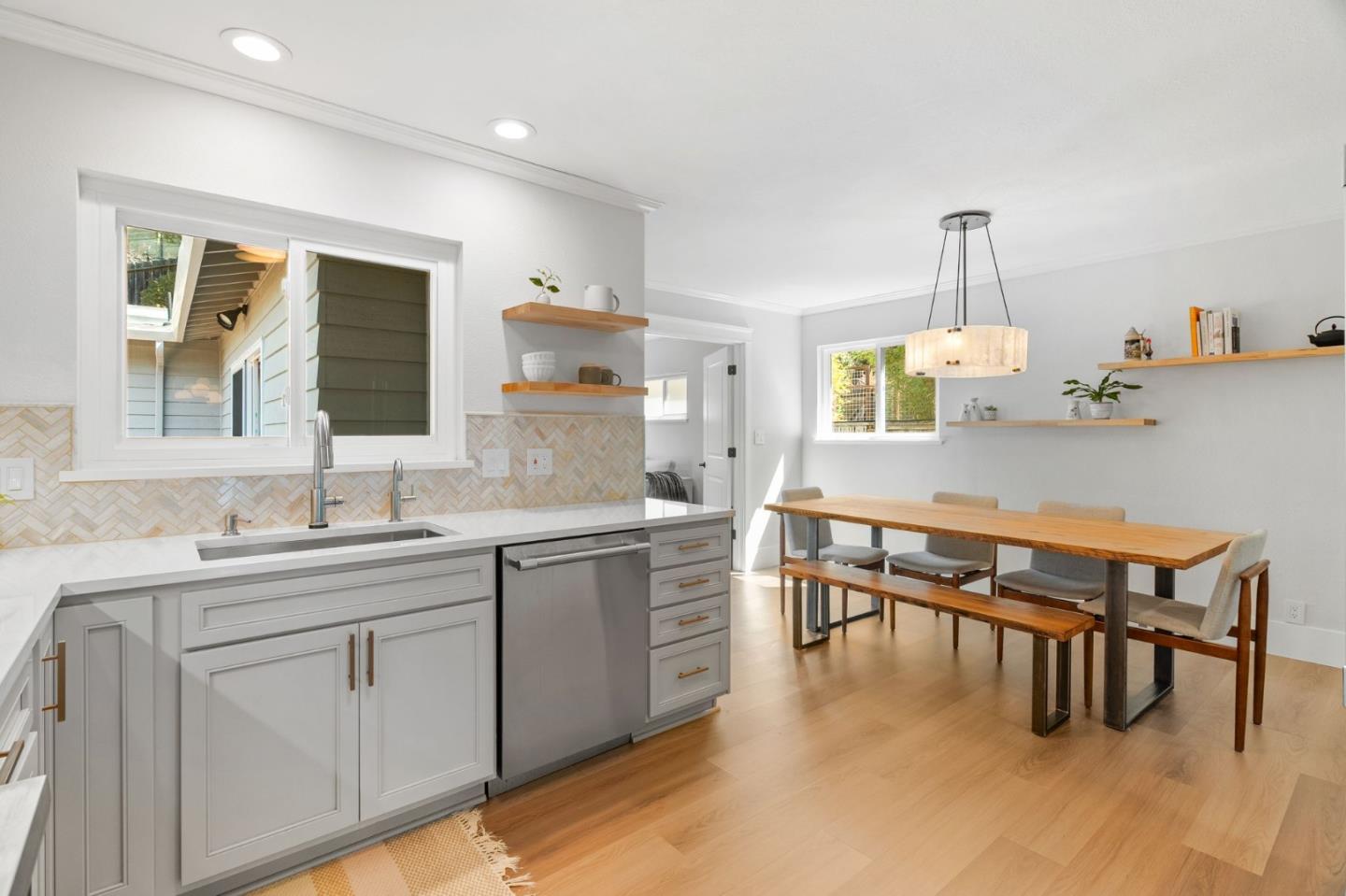 1085 Barcelona Drive Pacifica, CA 94044 - Photo 12 of 55 a kitchen with a sink cabinets and wooden floor