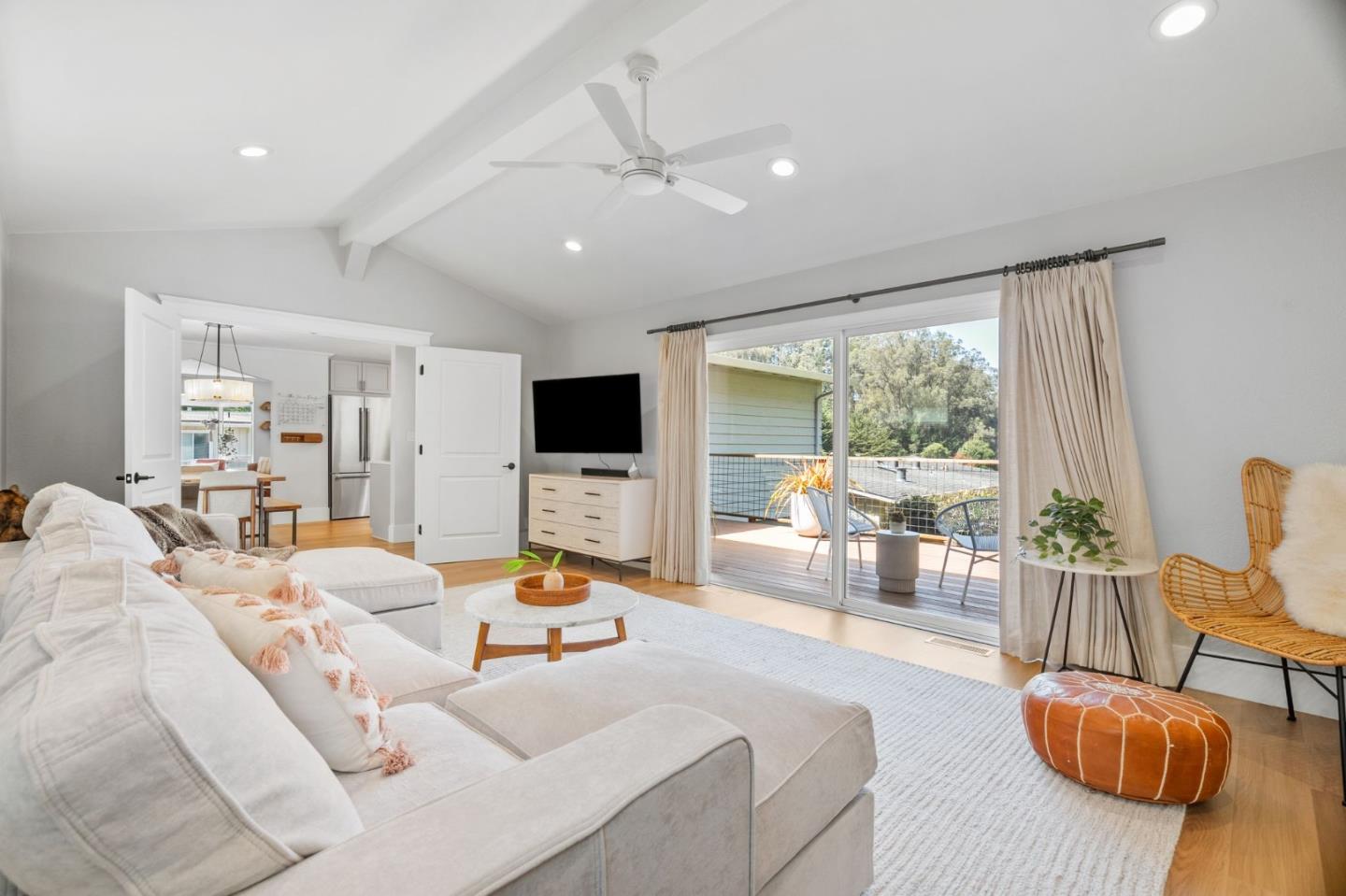 1085 Barcelona Drive Pacifica, CA 94044 - Photo 16 of 55 a living room with furniture and a flat screen tv