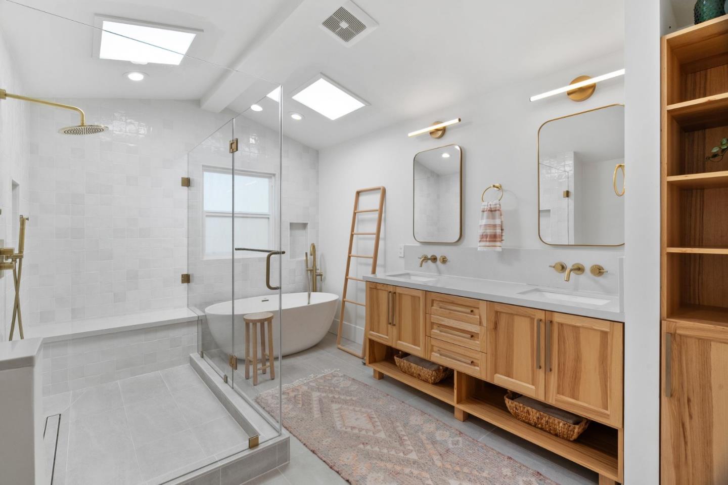 1085 Barcelona Drive Pacifica, CA 94044 - Photo 20 of 55 a bathroom with double vanity and a tub