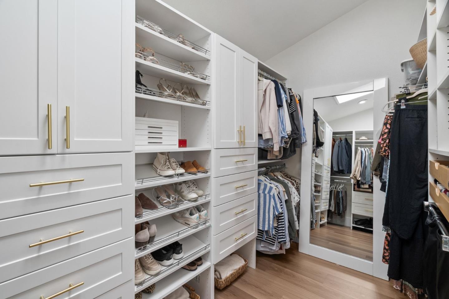 1085 Barcelona Drive Pacifica, CA 94044 - Photo 22 of 55 a view of walk in closet with clothes and shoes