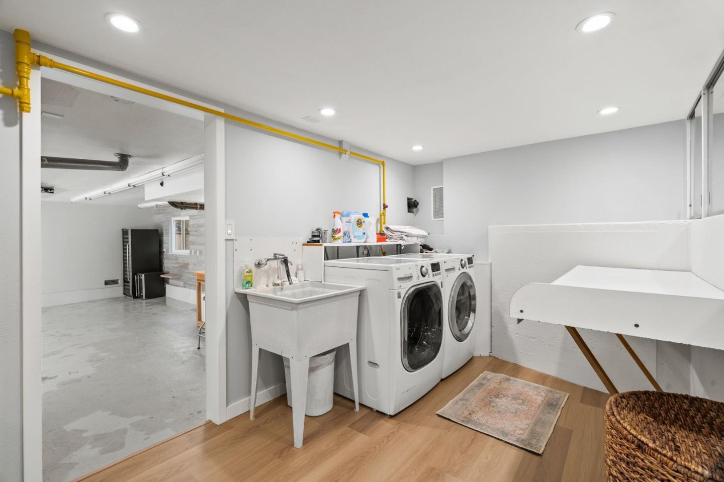 1085 Barcelona Drive Pacifica, CA 94044 - Photo 40 of 55 a utility room with sink dryer and washer