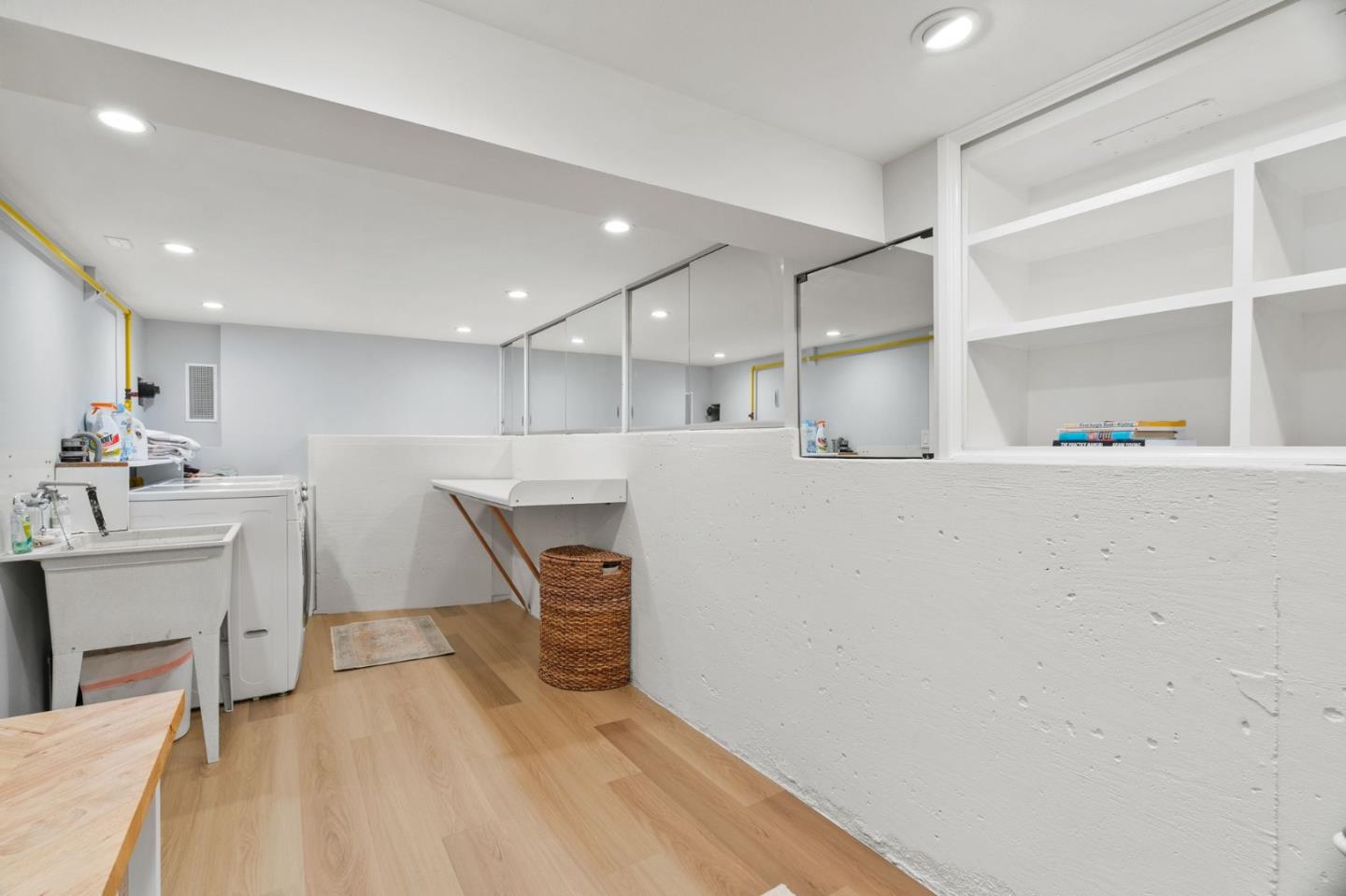 1085 Barcelona Drive Pacifica, CA 94044 - Photo 42 of 55 a living room with stainless steel appliances furniture a rug and a kitchen view