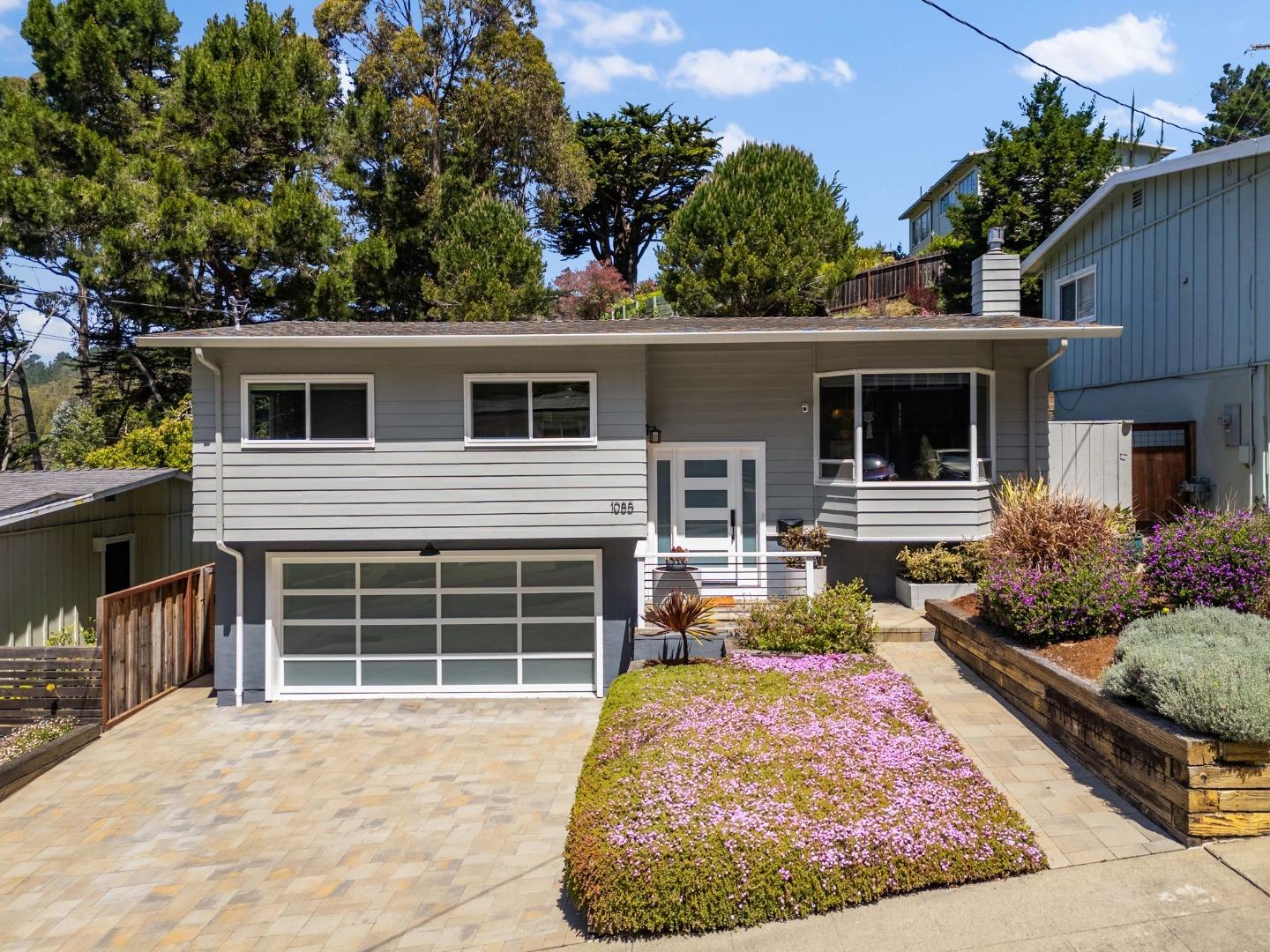 1085 Barcelona Drive Pacifica, CA 94044 - Photo 44 of 55 a front view of a house with garden