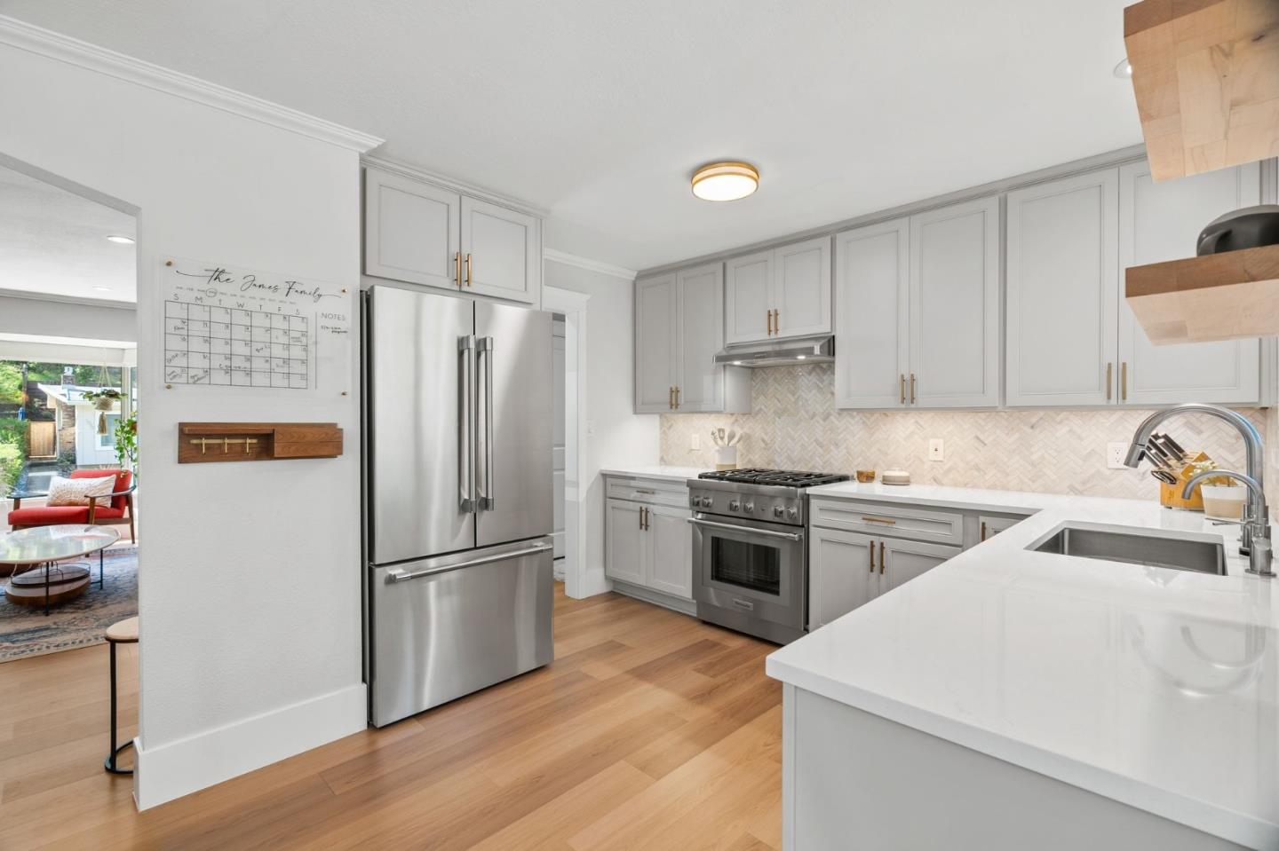 1085 Barcelona Drive Pacifica, CA 94044 - Photo 8 of 55 a kitchen with a refrigerator stove top oven and sink