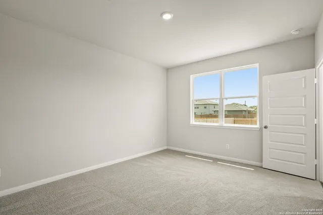 an empty room with a window
