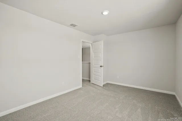 an empty room with an entryway