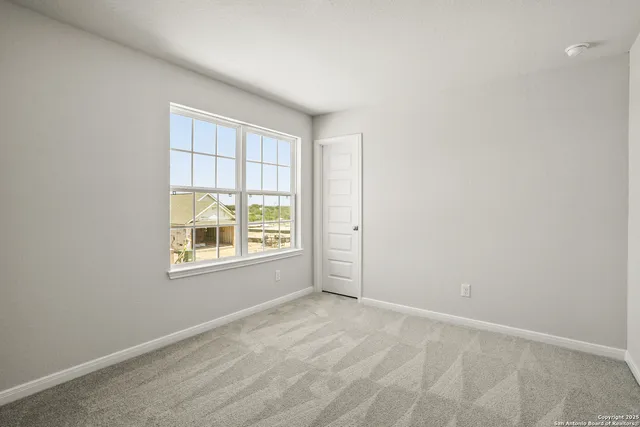 an empty room with a window