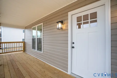 a view of a house with wooden floor
