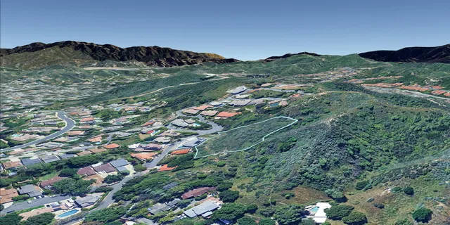 a view of city and mountain