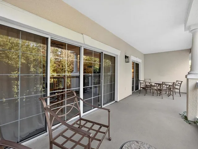 a view of a livingroom with furniture and table