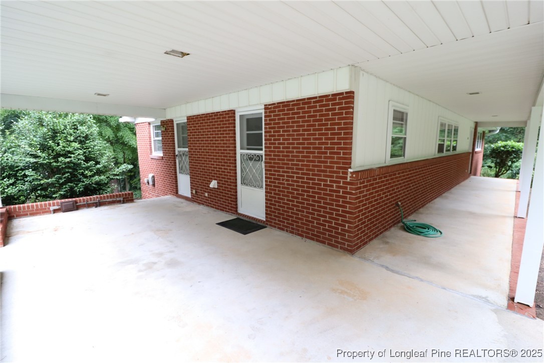 1426 Trinity Circle Raleigh, NC 27607 - Photo 2 of 31 a view of a house with a yard
