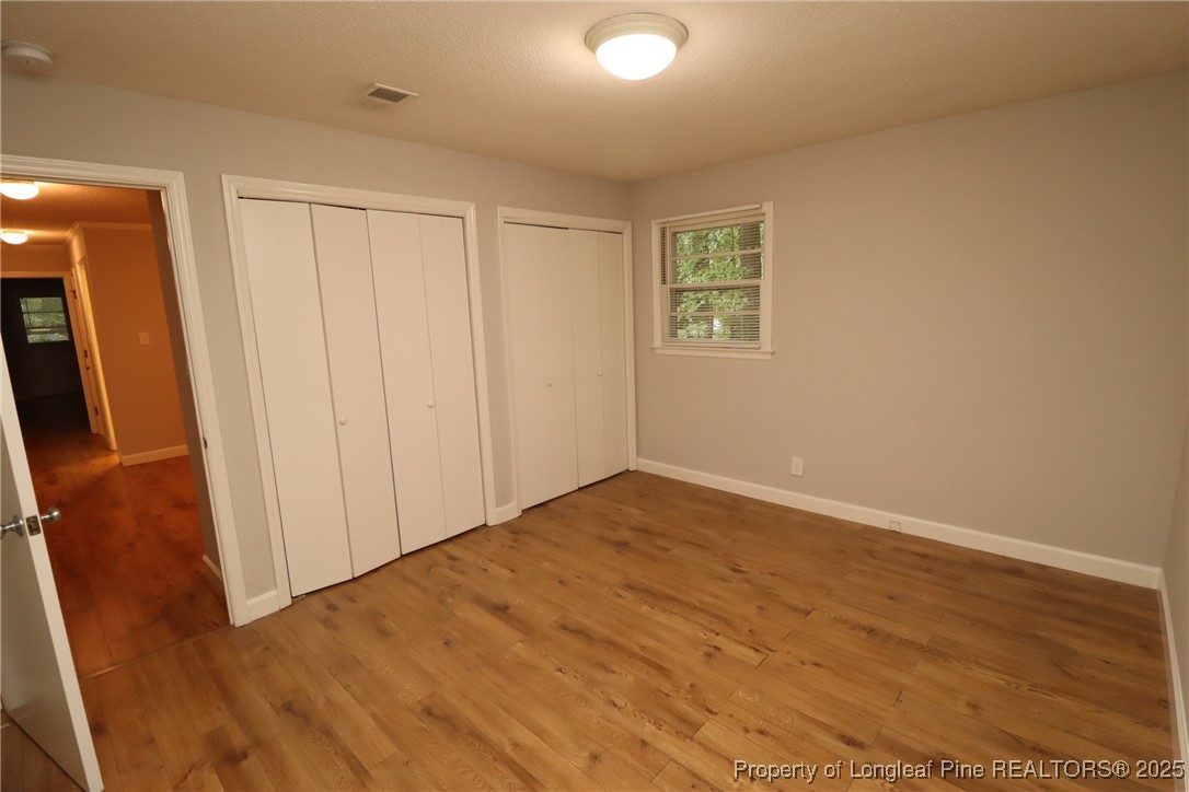 1426 Trinity Circle Raleigh, NC 27607 - Photo 29 of 31 wooden floor in an empty room