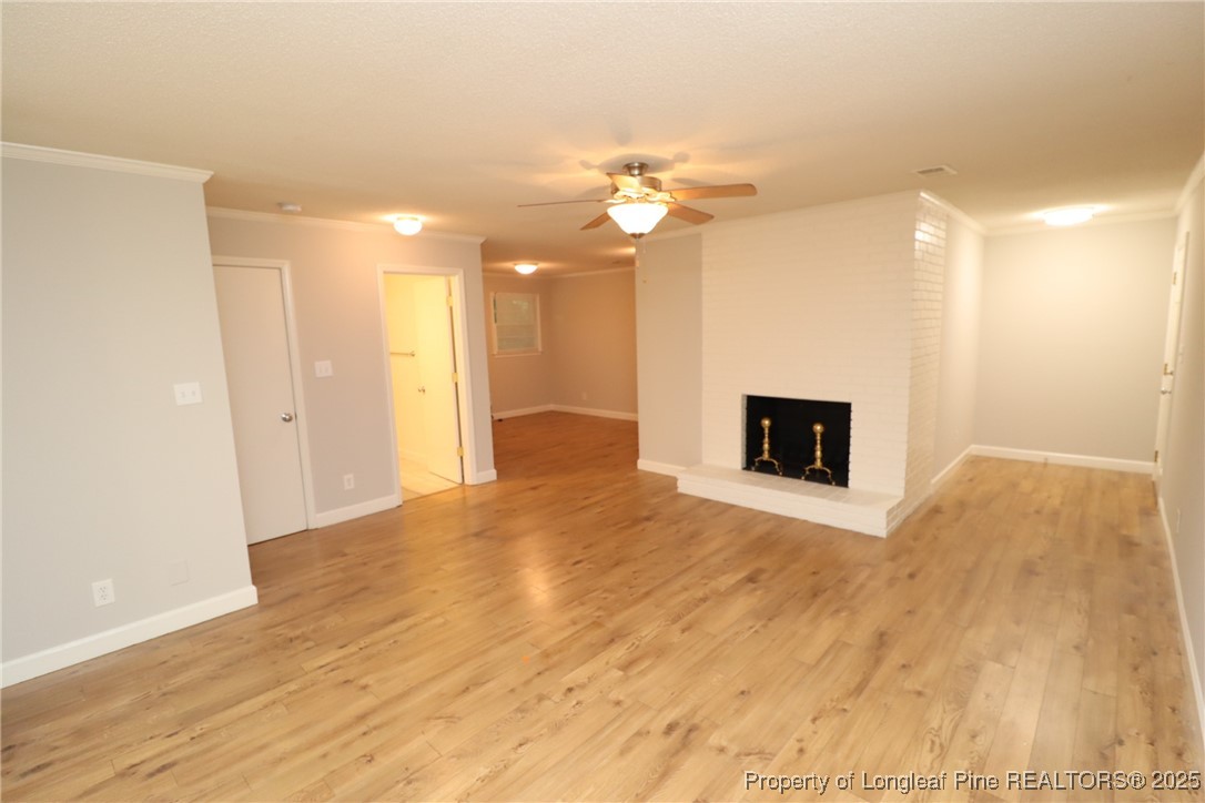 1426 Trinity Circle Raleigh, NC 27607 - Photo 3 of 31 a view of a livingroom with a fireplace