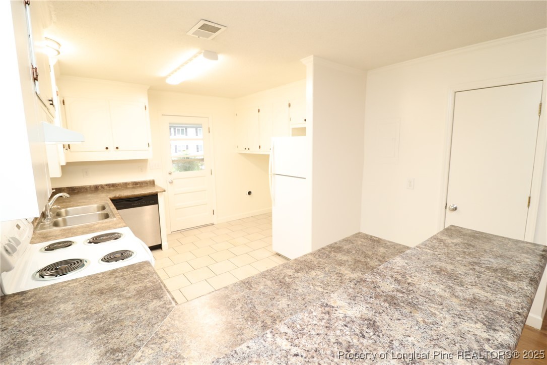 1426 Trinity Circle Raleigh, NC 27607 - Photo 7 of 31 a view of a bedroom with a sink