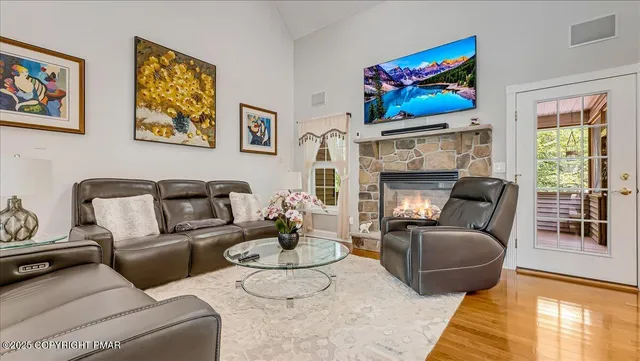a kitchen with stainless steel appliances granite countertop a sink and cabinets