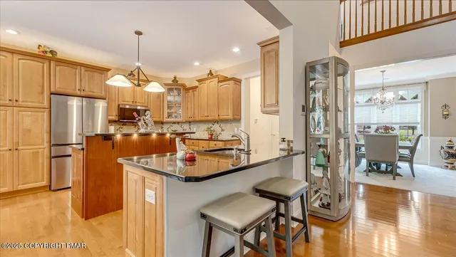 a view of a patio with a table and chairs