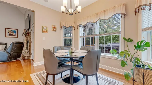 a view of living room with furniture and flat screen tv