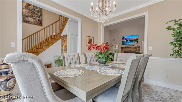 a bed sitting in a bedroom next to a window with a dresser