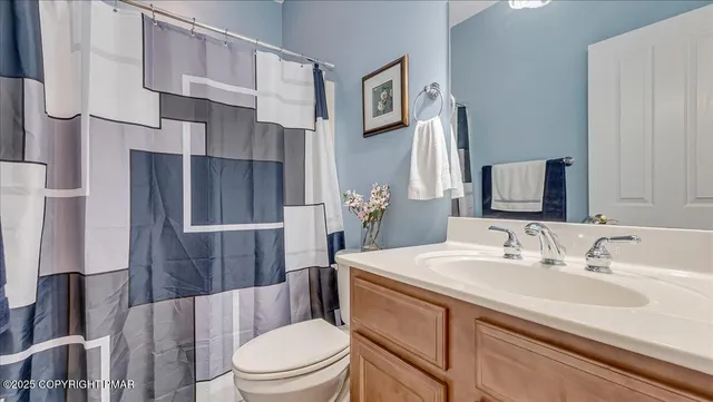 a view of a storage room with racks on the wall